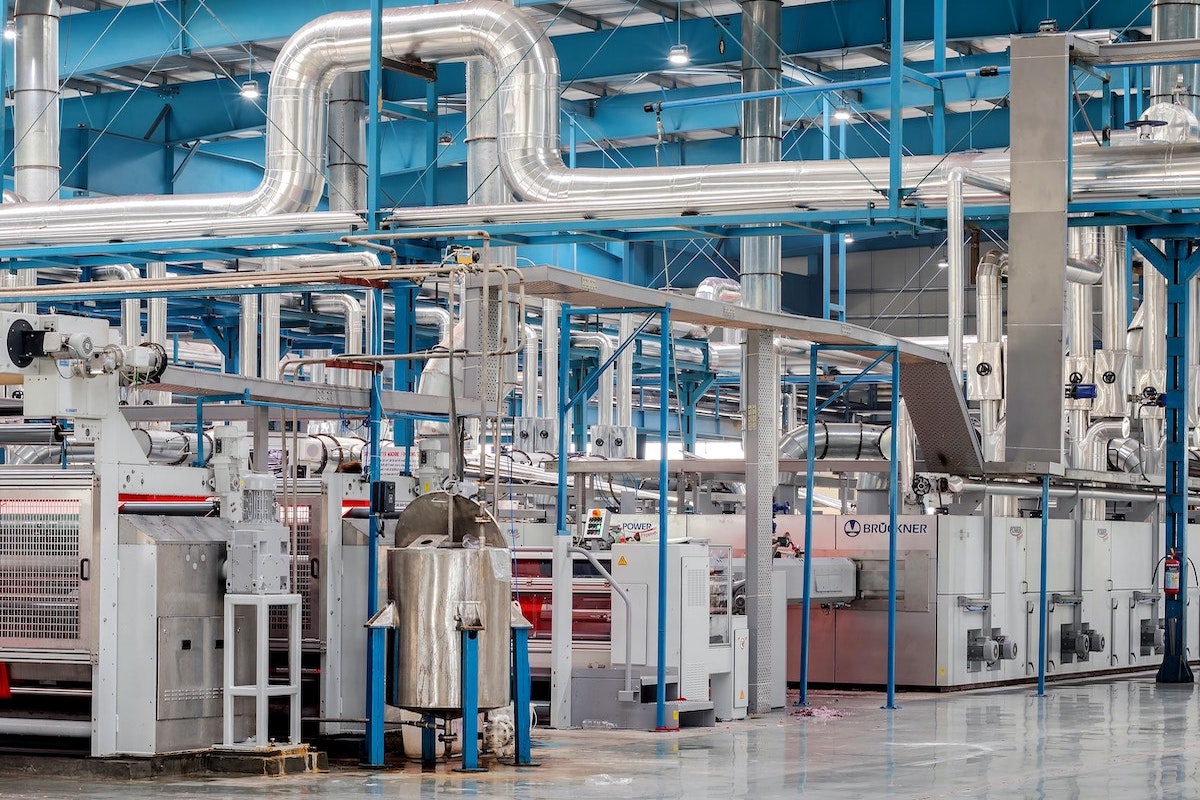 How Can Large Manufacturers Digitalize Their Business Models? A Framework for Orchestrating Industrial Ecosystems